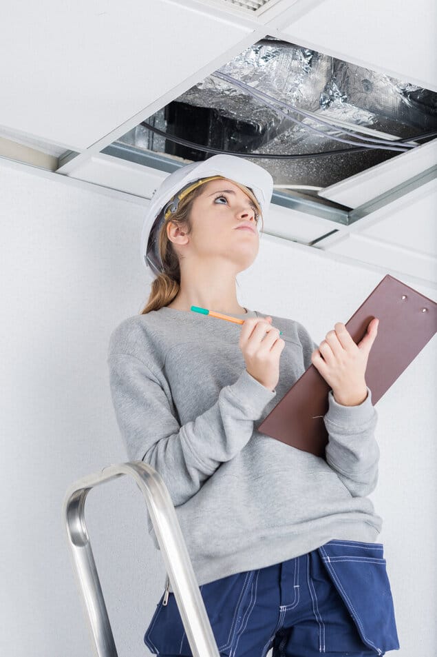 Candace Bosch | EXP Realty | 6 Mistakes Home Buyers Make | building inspector checking the ceiling